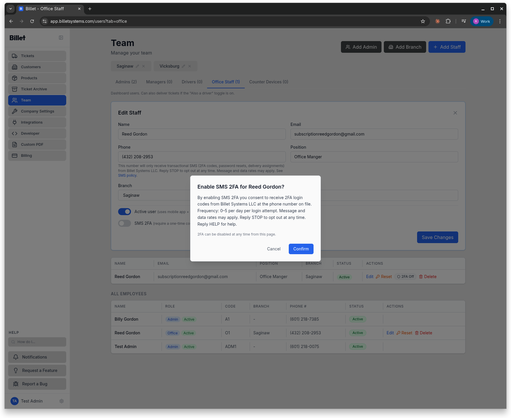 Team page user row showing the SMS 2FA toggle in the off state with a confirmation modal that explains the SMS terms before enabling.